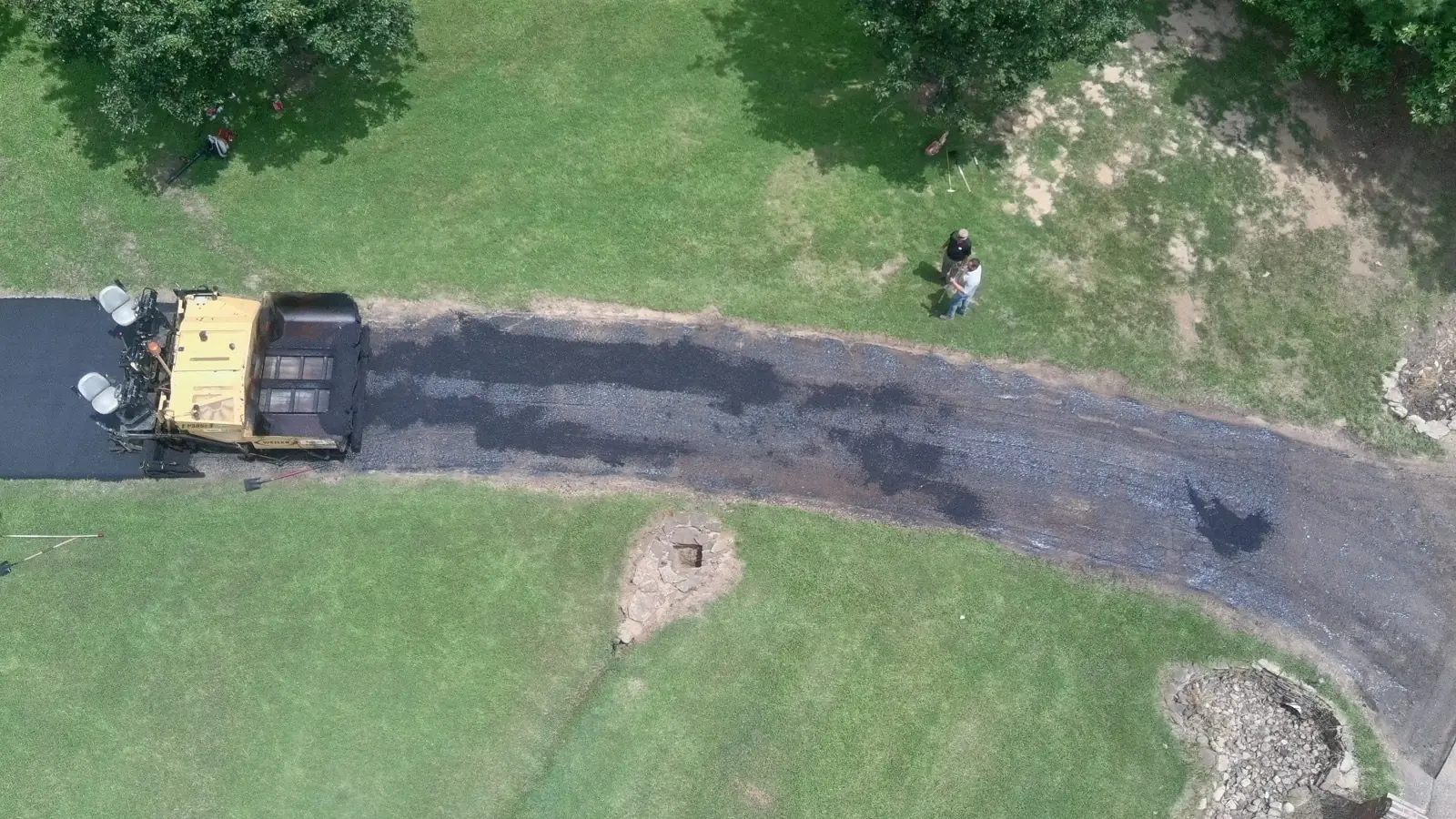 Wide view of an asphalt paving job in progress